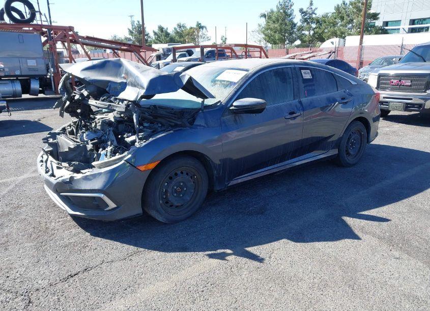 Photo 2 of 2019 Honda Civic LX (VIN 19XFC2F69KE203827)