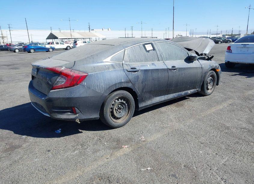 Photo 4 of 2019 Honda Civic LX (VIN 19XFC2F69KE203827)