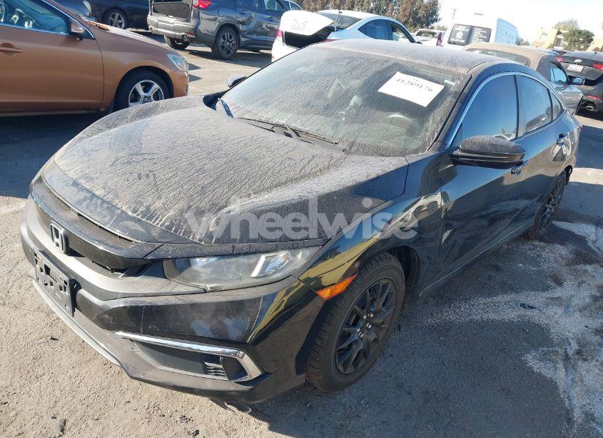 Photo 2 of 2019 Honda Civic LX (VIN 19XFC2F69KE212091)