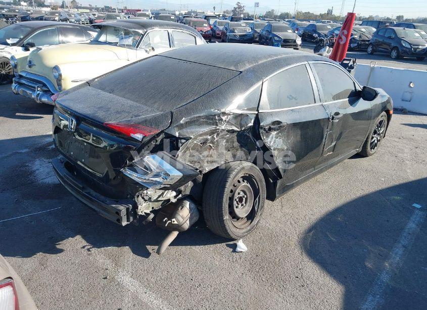 Photo 4 of 2019 Honda Civic LX (VIN 19XFC2F69KE212091)