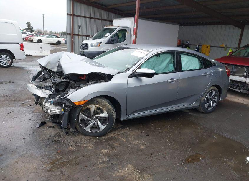 Photo 2 of 2019 Honda Civic LX (VIN 19XFC2F69KE213063)