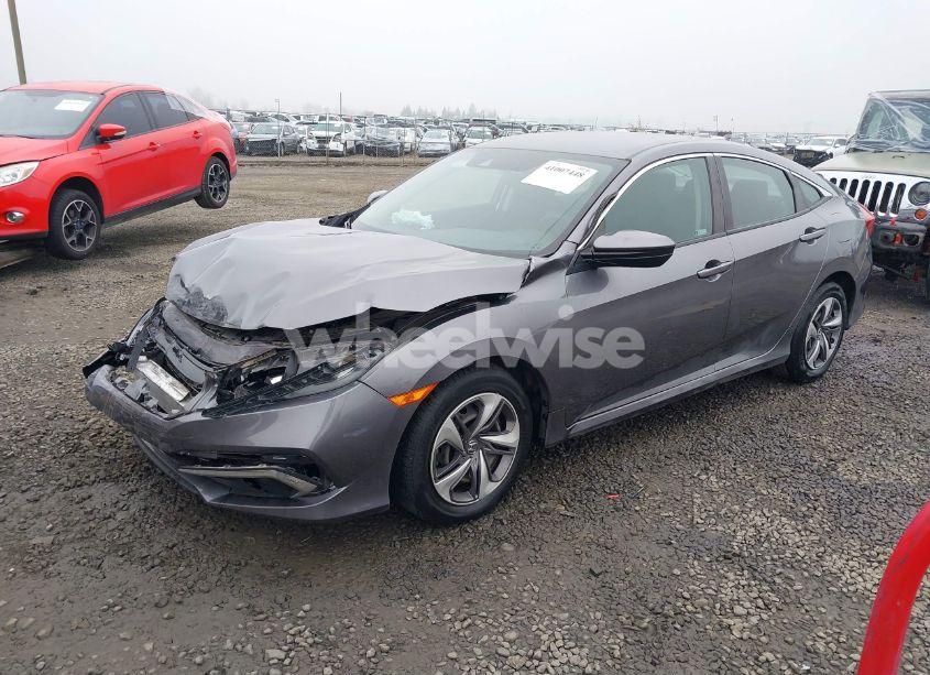 Photo 2 of 2020 Honda Civic LX (VIN 19XFC2F69LE202422)