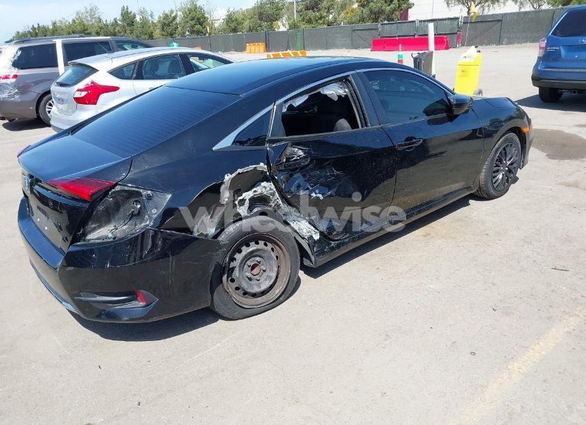 Photo 4 of 2020 Honda Civic LX (VIN 19XFC2F69LE210049)