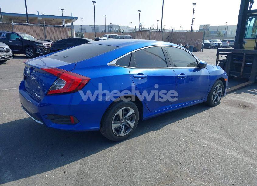 Photo 4 of 2020 Honda Civic LX (VIN 19XFC2F69LE212965)