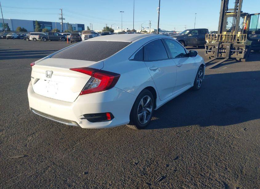 Photo 4 of 2020 Honda Civic LX (VIN 19XFC2F69LE216711)
