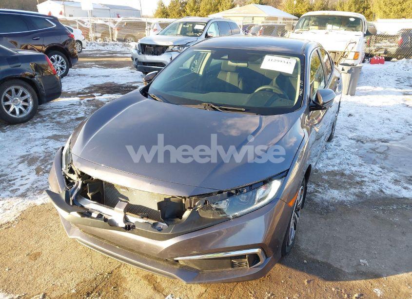 Photo 2 of 2021 Honda Civic LX (VIN 19XFC2F69ME001623)
