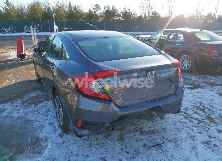 Photo 3 of 2021 Honda Civic LX (VIN 19XFC2F69ME001623)