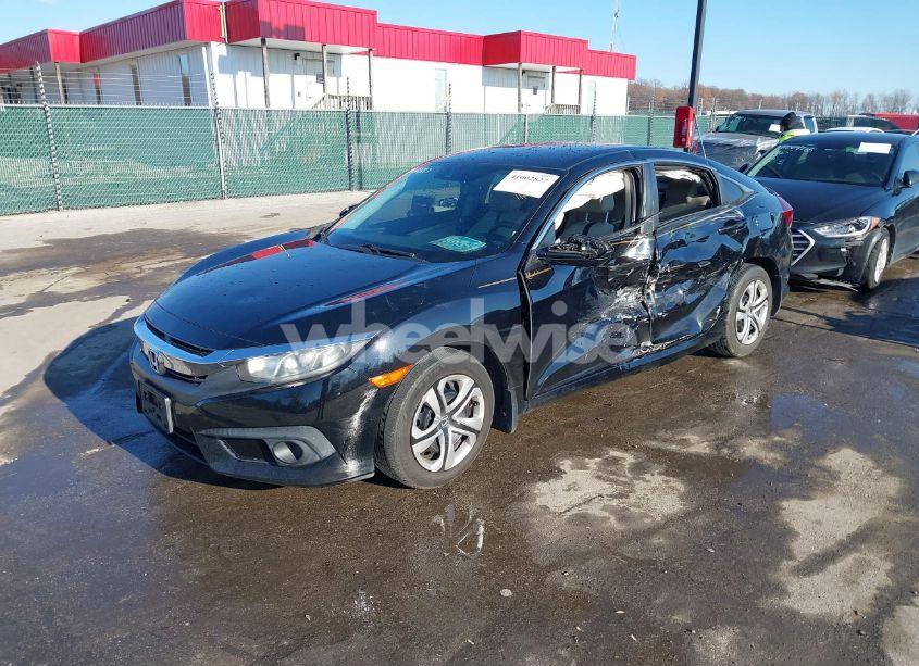 Photo 2 of 2017 Honda Civic LX (VIN 19XFC2F6XHE225196)