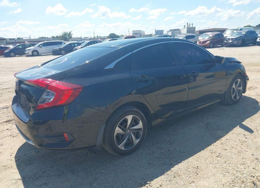 Photo 4 of 2019 Honda Civic LX (VIN 19XFC2F6XKE021960)