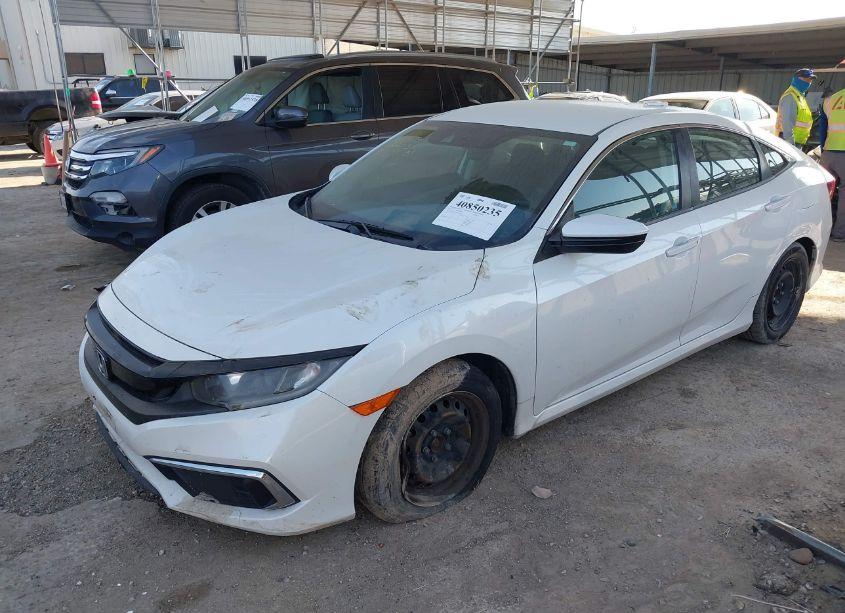 Photo 2 of 2019 Honda Civic LX (VIN 19XFC2F6XKE030285)