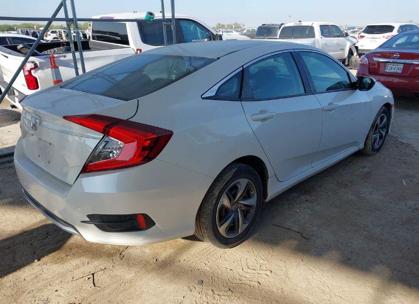 Photo 4 of 2019 Honda Civic LX (VIN 19XFC2F6XKE030285)