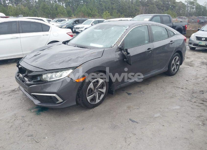 Photo 2 of 2019 Honda Civic LX (VIN 19XFC2F6XKE030755)