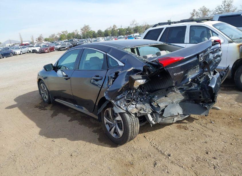 Photo 3 of 2019 Honda Civic LX (VIN 19XFC2F6XKE203819)