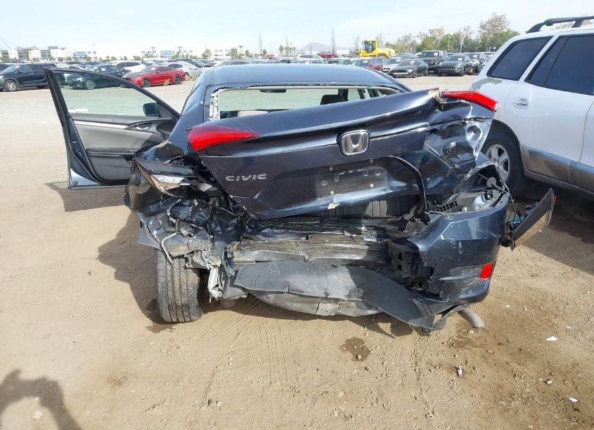 Photo 6 of 2019 Honda Civic LX (VIN 19XFC2F6XKE203819)