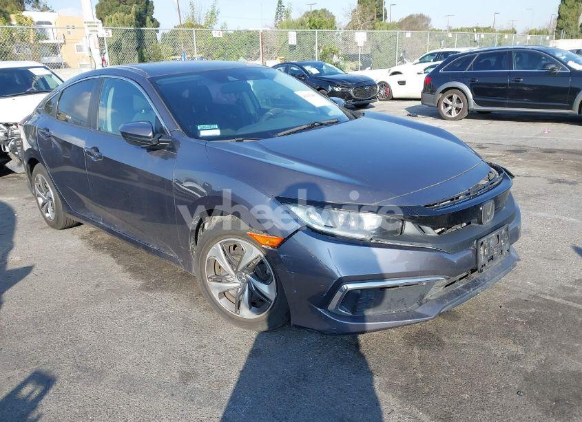 2019 Honda Civic LX (VIN 19XFC2F6XKE207658) main photo