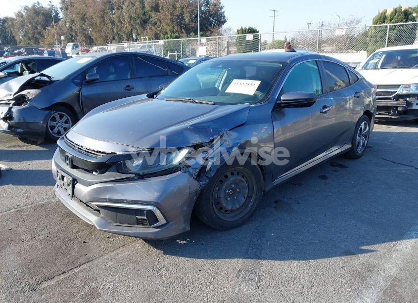 Photo 2 of 2019 Honda Civic LX (VIN 19XFC2F6XKE207658)