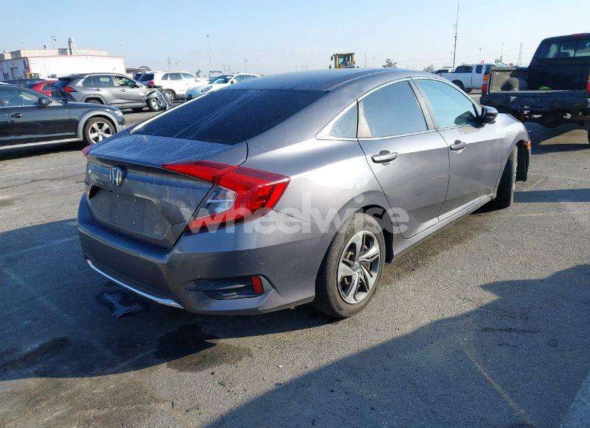 Photo 4 of 2019 Honda Civic LX (VIN 19XFC2F6XKE207658)