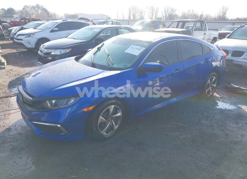 Photo 2 of 2020 Honda Civic LX (VIN 19XFC2F6XLE011219)