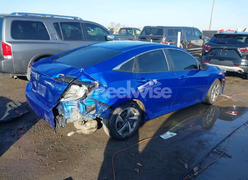 Photo 4 of 2020 Honda Civic LX (VIN 19XFC2F6XLE011219)