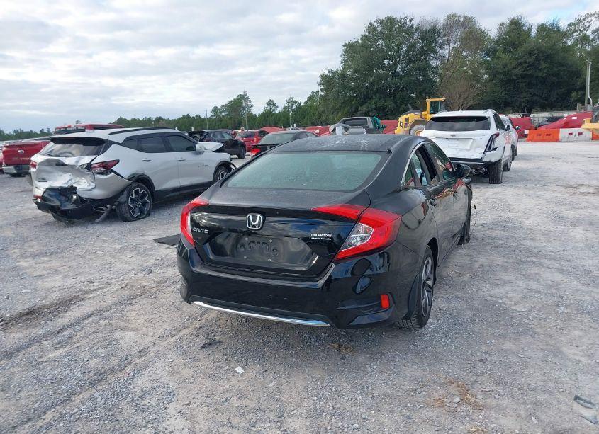 Photo 4 of 2020 Honda Civic LX (VIN 19XFC2F6XLE025590)