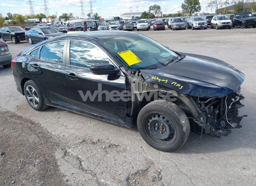 2020 Honda Civic LX (VIN 19XFC2F6XLE028697) main photo