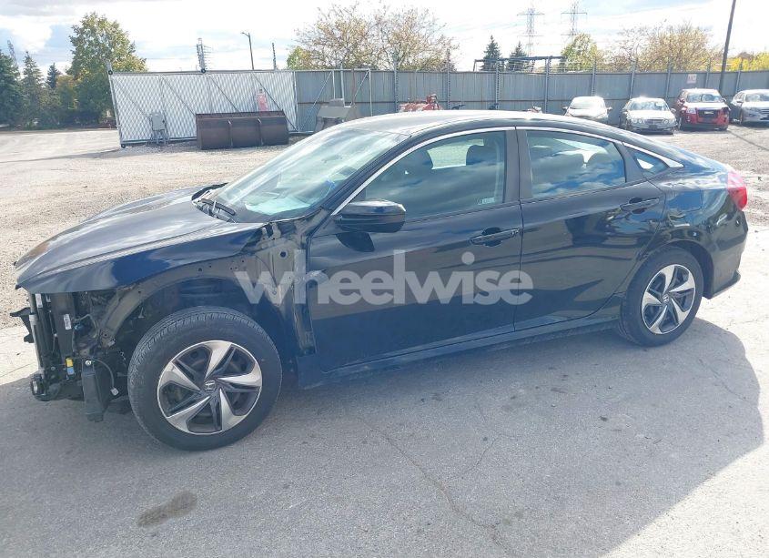 Photo 2 of 2020 Honda Civic LX (VIN 19XFC2F6XLE028697)