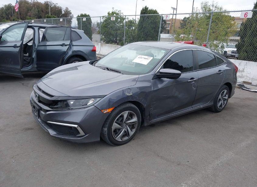 Photo 2 of 2020 Honda Civic LX (VIN 19XFC2F6XLE212232)