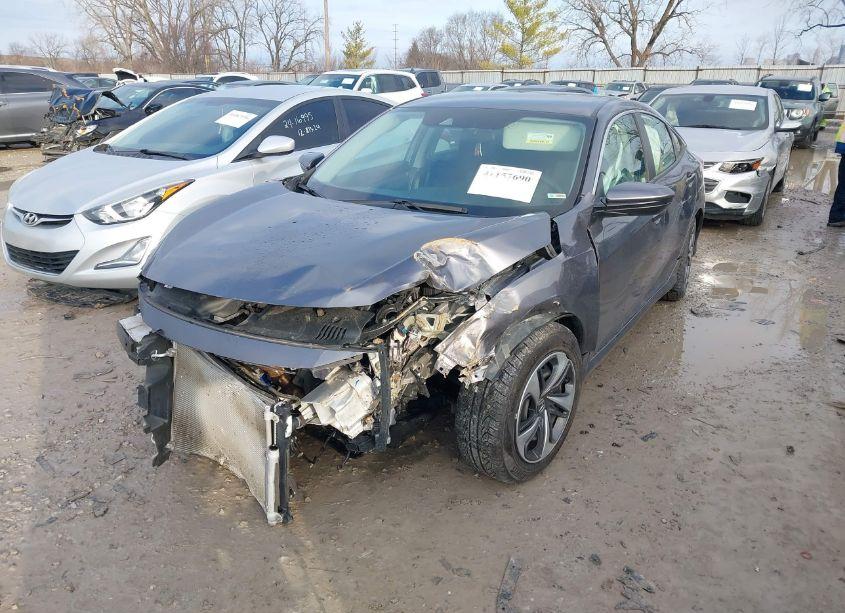 Photo 2 of 2021 Honda Civic LX (VIN 19XFC2F6XME001534)