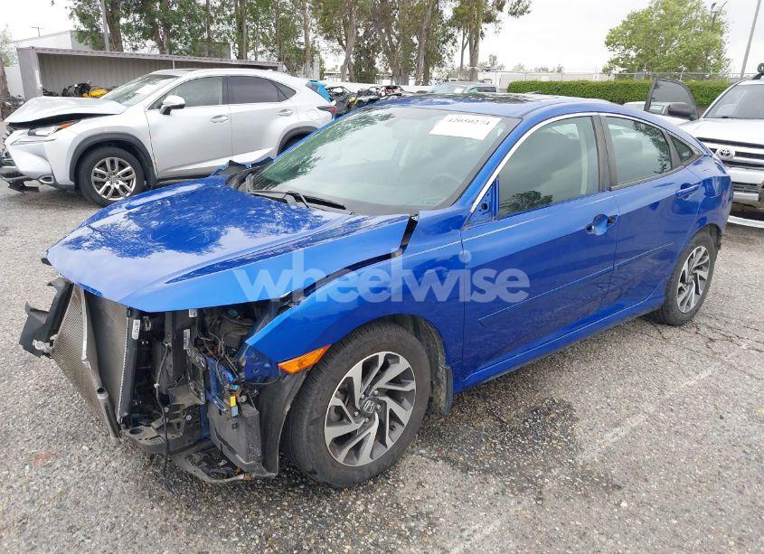 Photo 2 of 2016 Honda Civic EX (VIN 19XFC2F70GE077339)