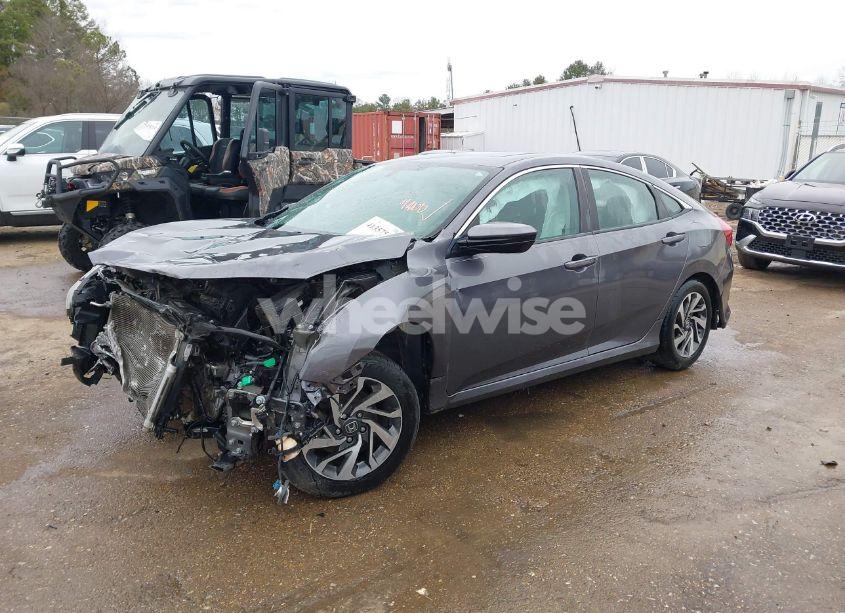 Photo 2 of 2017 Honda Civic EX (VIN 19XFC2F70HE045038)