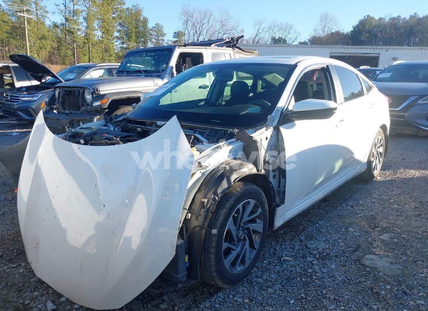 Photo 2 of 2017 Honda Civic EX (VIN 19XFC2F70HE058243)