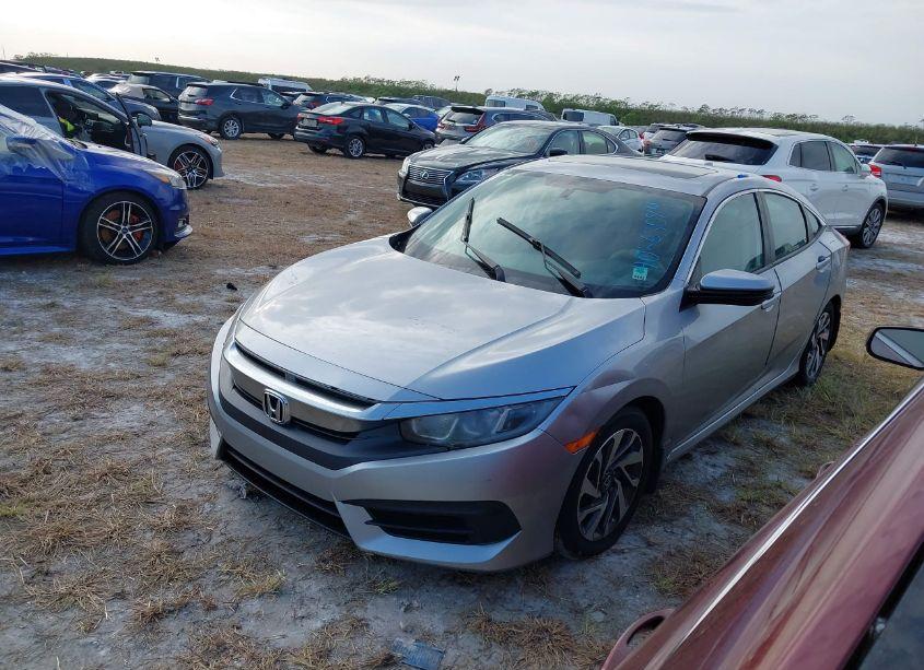 Photo 2 of 2018 Honda Civic EX (VIN 19XFC2F70JE007041)
