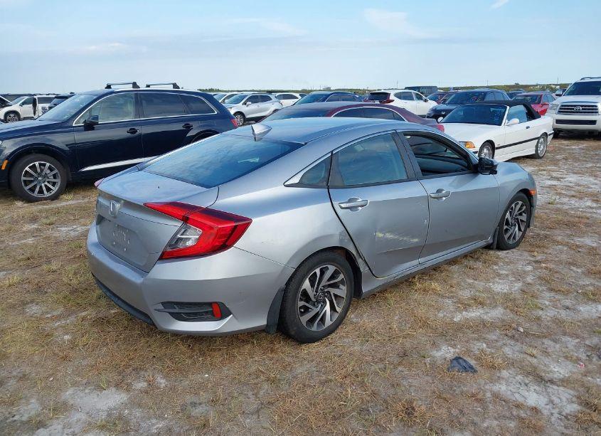 Photo 4 of 2018 Honda Civic EX (VIN 19XFC2F70JE007041)