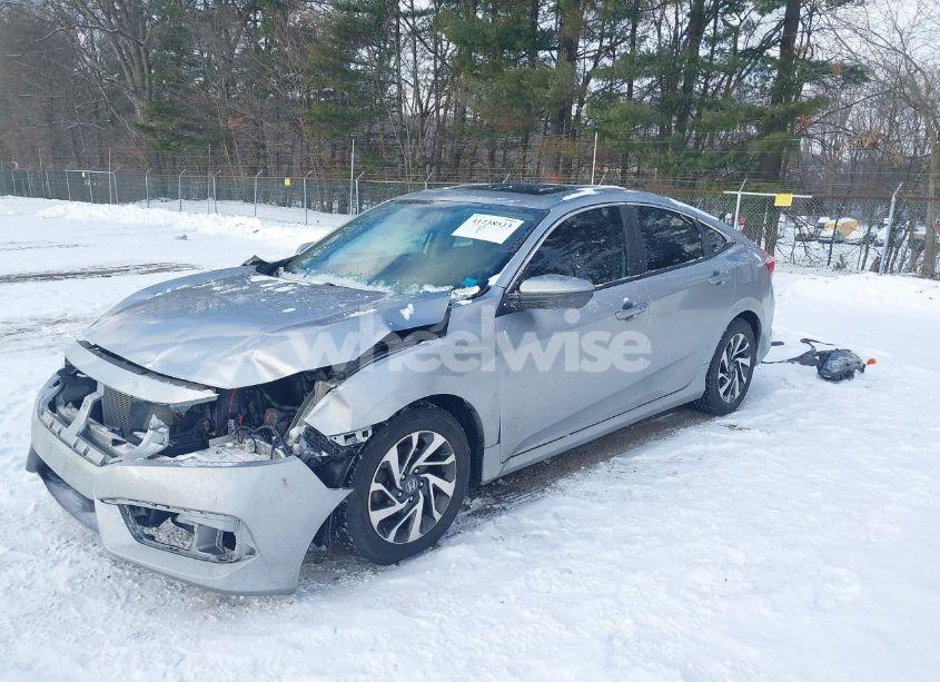 Photo 2 of 2018 Honda Civic EX (VIN 19XFC2F70JE009114)