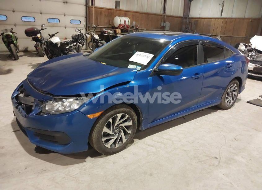 Photo 2 of 2018 Honda Civic EX (VIN 19XFC2F71JE007016)