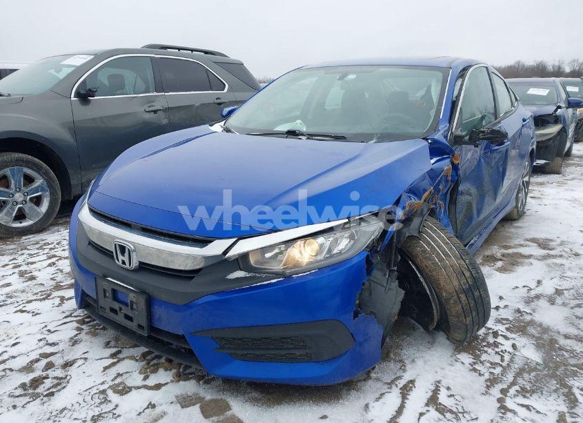 Photo 2 of 2018 Honda Civic EX (VIN 19XFC2F71JE014807)