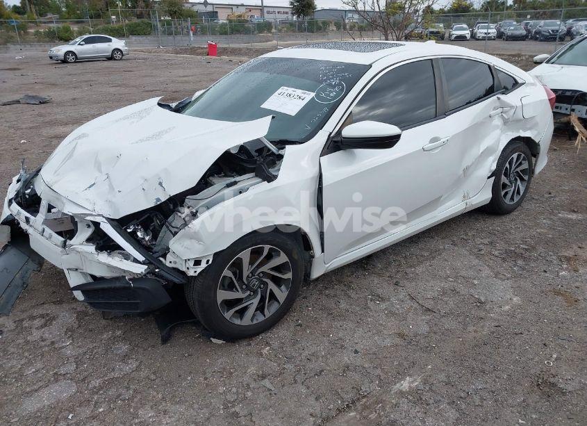 Photo 2 of 2018 Honda Civic EX (VIN 19XFC2F71JE023944)