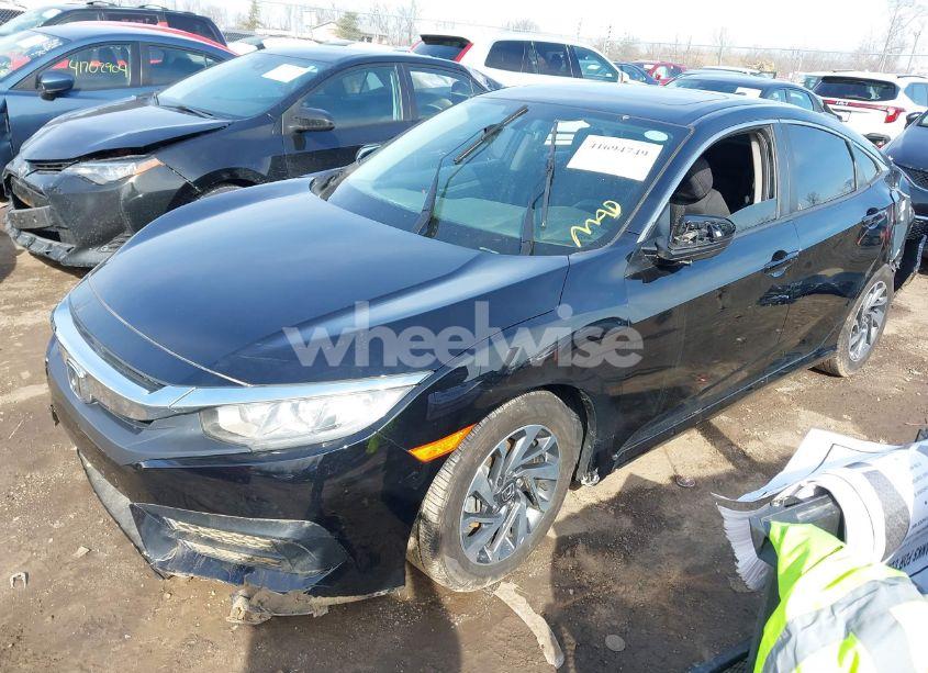 Photo 2 of 2018 Honda Civic EX (VIN 19XFC2F71JE043899)