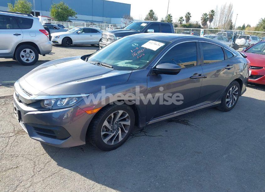 Photo 2 of 2018 Honda Civic EX (VIN 19XFC2F71JE201514)