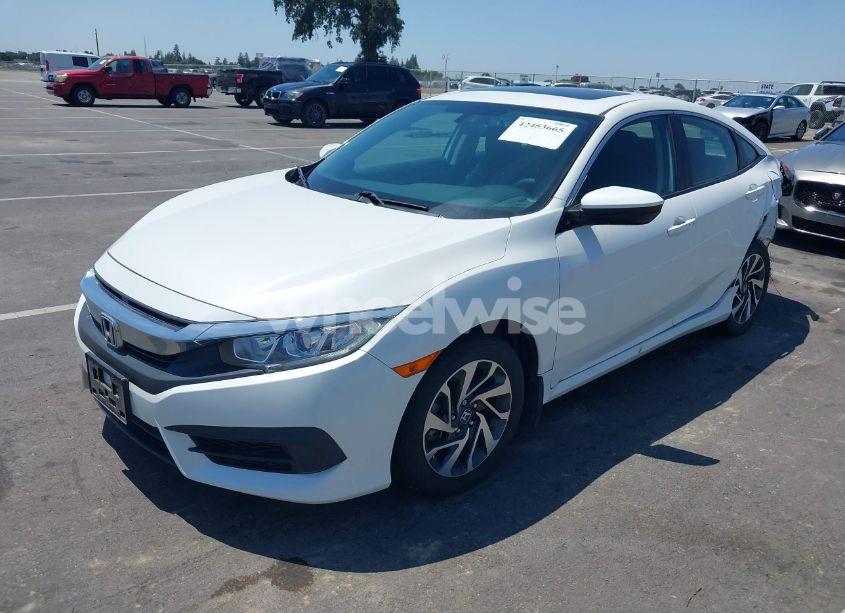 Photo 2 of 2017 Honda Civic EX (VIN 19XFC2F74HE212016)