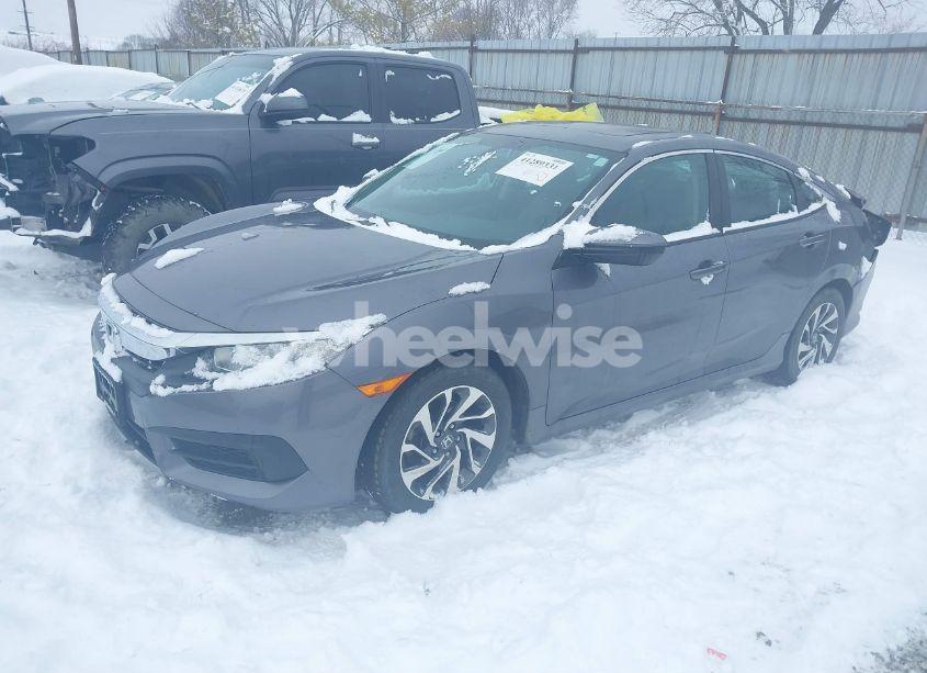 Photo 2 of 2018 Honda Civic EX (VIN 19XFC2F74JE002523)