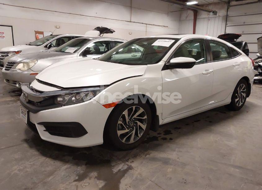 Photo 2 of 2018 Honda Civic EX (VIN 19XFC2F74JE005647)