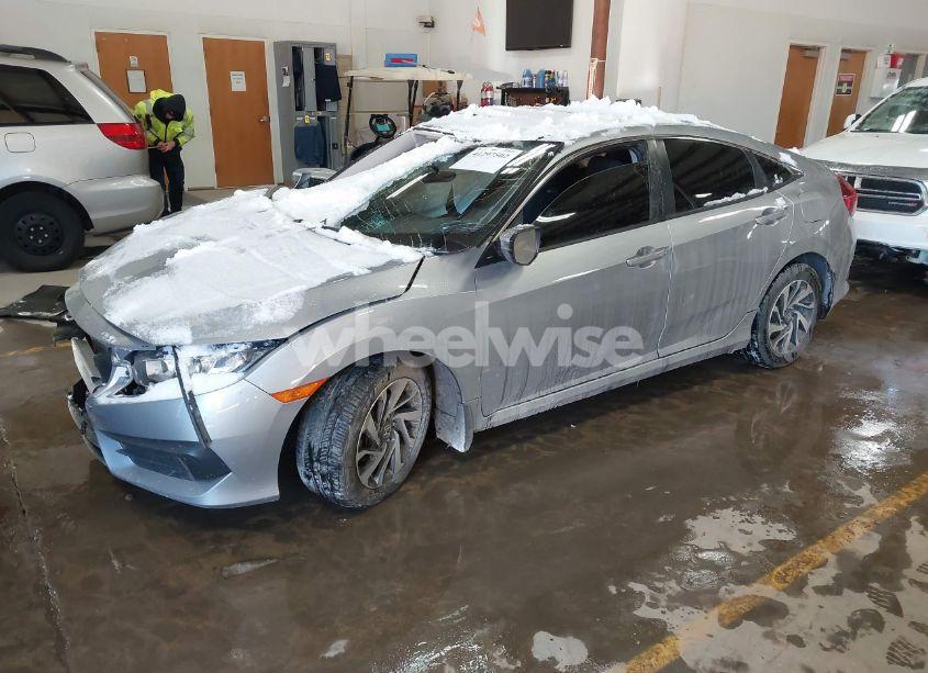 Photo 2 of 2018 Honda Civic EX (VIN 19XFC2F74JE007057)