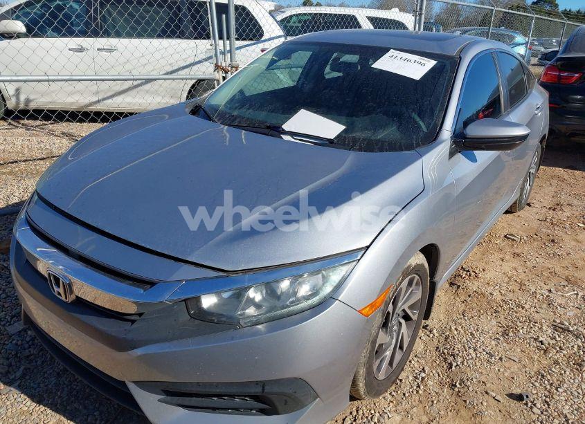 Photo 2 of 2018 Honda Civic EX (VIN 19XFC2F74JE043654)