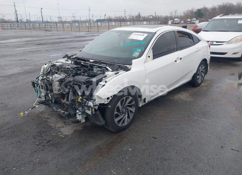 Photo 2 of 2017 Honda Civic EX (VIN 19XFC2F75HE080691)