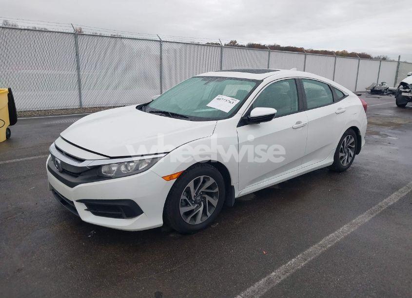 Photo 2 of 2017 Honda Civic EX (VIN 19XFC2F76HE014182)