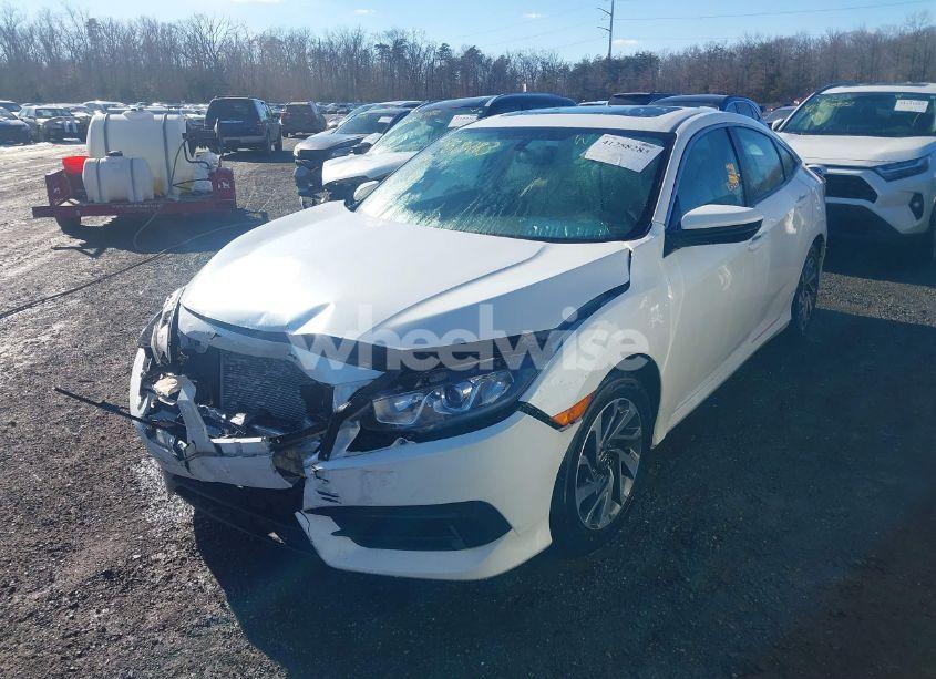 Photo 2 of 2017 Honda Civic EX (VIN 19XFC2F76HE211871)