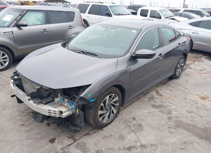 Photo 2 of 2018 Honda Civic EX (VIN 19XFC2F76JE002121)