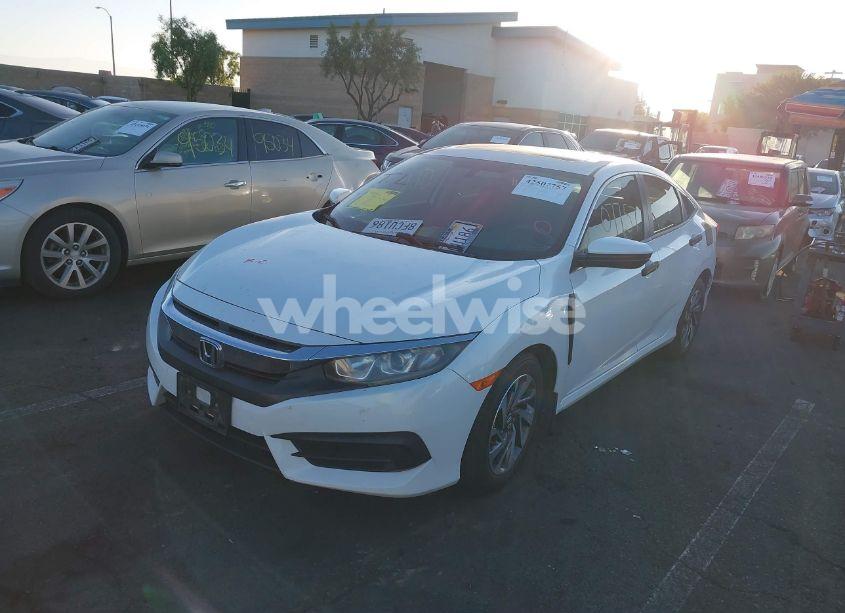 Photo 2 of 2018 Honda Civic EX (VIN 19XFC2F76JE206921)