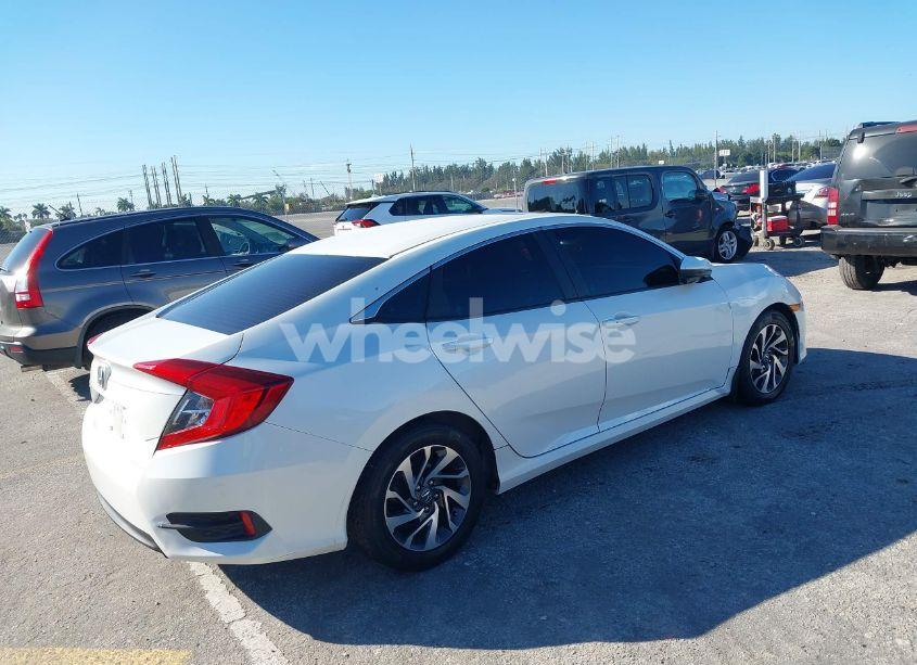 Photo 4 of 2016 Honda Civic EX (VIN 19XFC2F77GE010219)